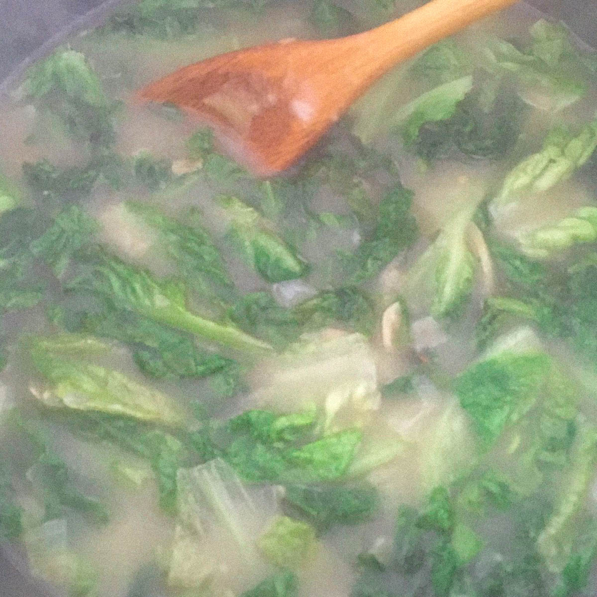 Water erbij en 8 minuten koken