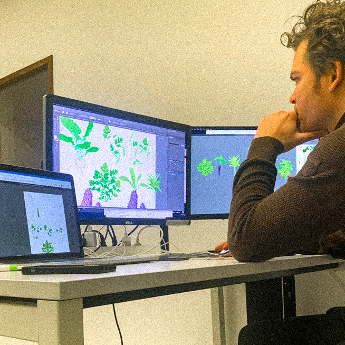 Robbin tekent de nieuwe plantjes voor de Makkelijke Moestuin app
